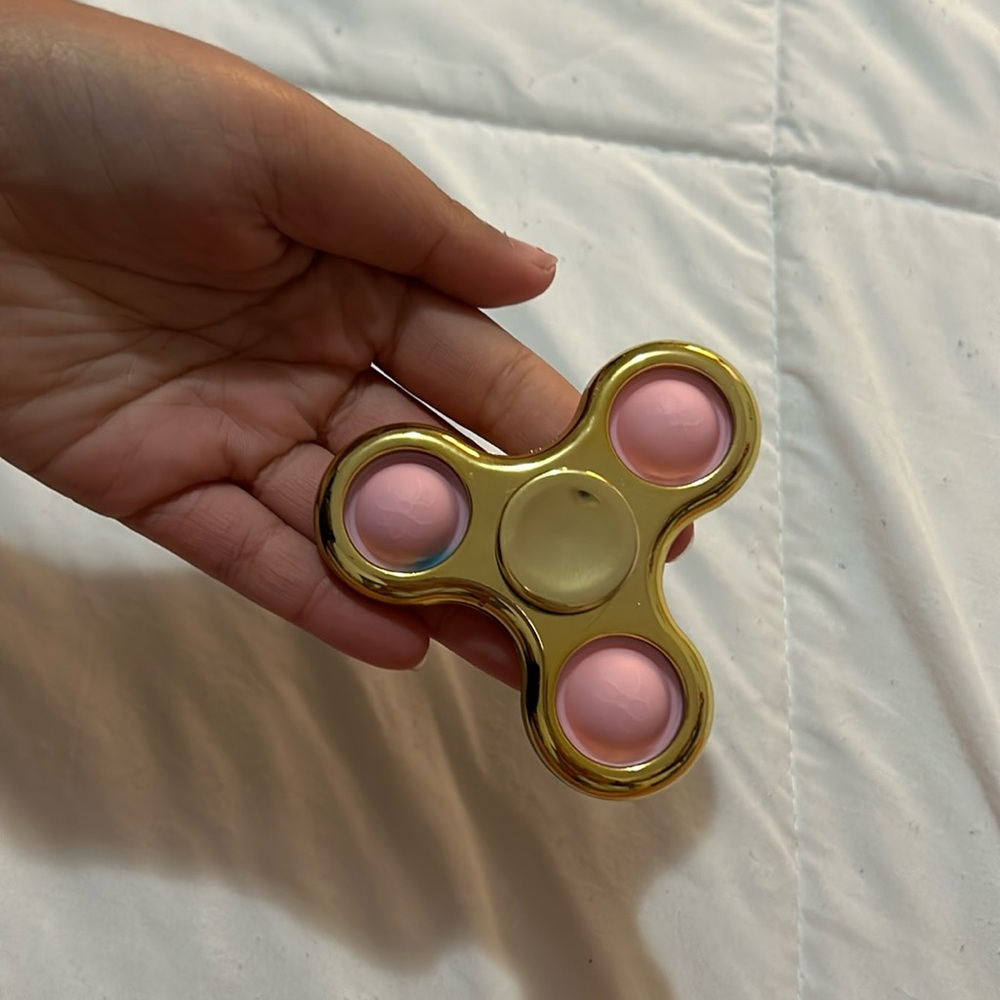 Small blue mark that fidget spinner came with on poppet part
